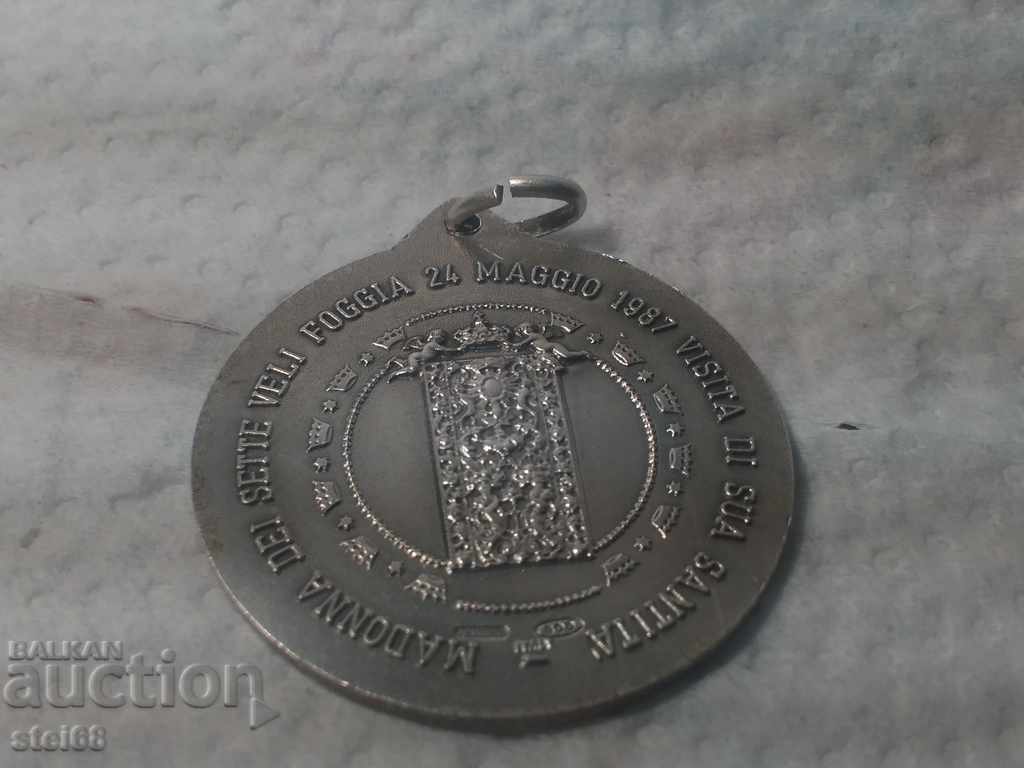 Delivery of SILVER PAPAL MEDAL