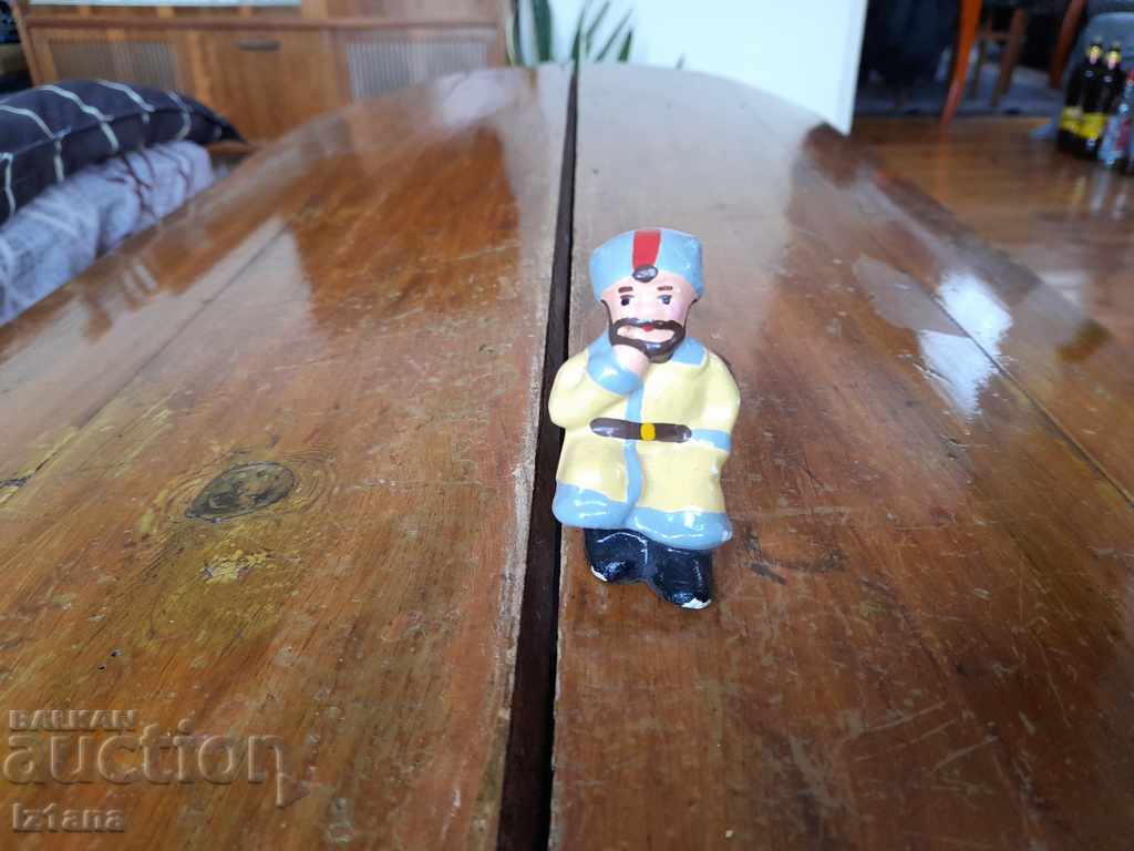 Old ceramic figurine, man