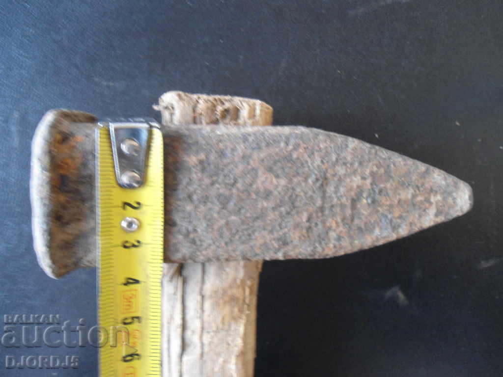 Delivery of Old hammer, wooden handle