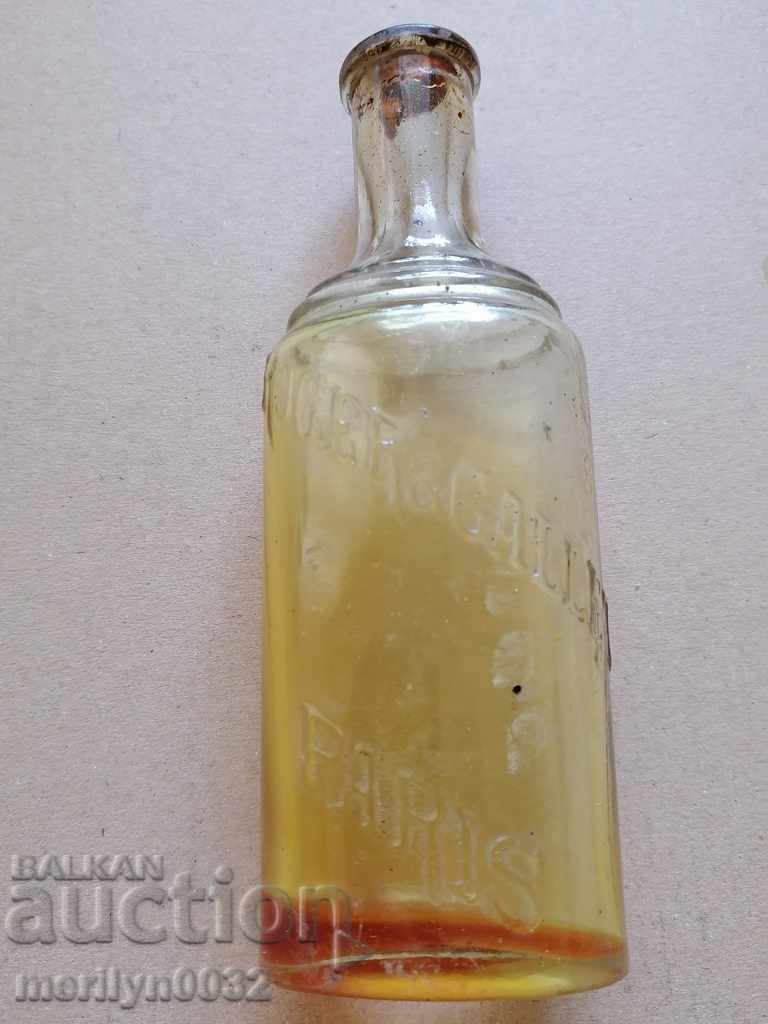 Sticla veche de ulei, sticla marca PARIS cu preț 30.00 BGN | € 15.34 Sticla veche de ulei, sticla marca PARIS cu preț 30.00 BGN | € 15.34