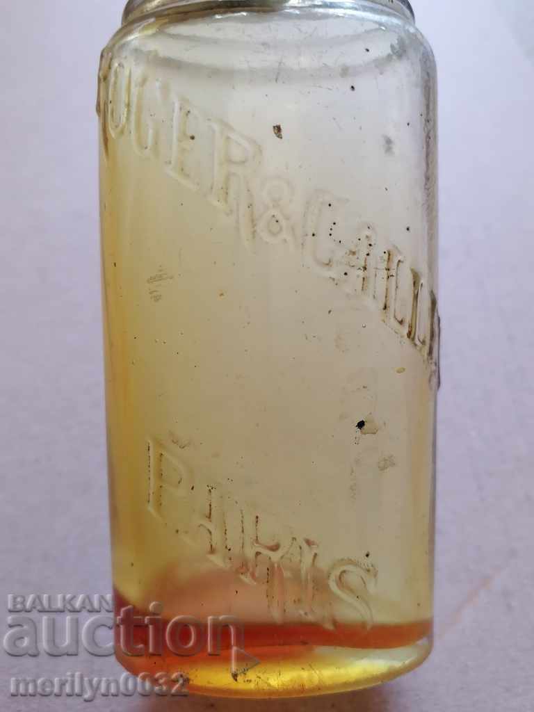 Licitație Sticla veche de ulei, sticla marca PARIS Licitație Sticla veche de ulei, sticla marca PARIS