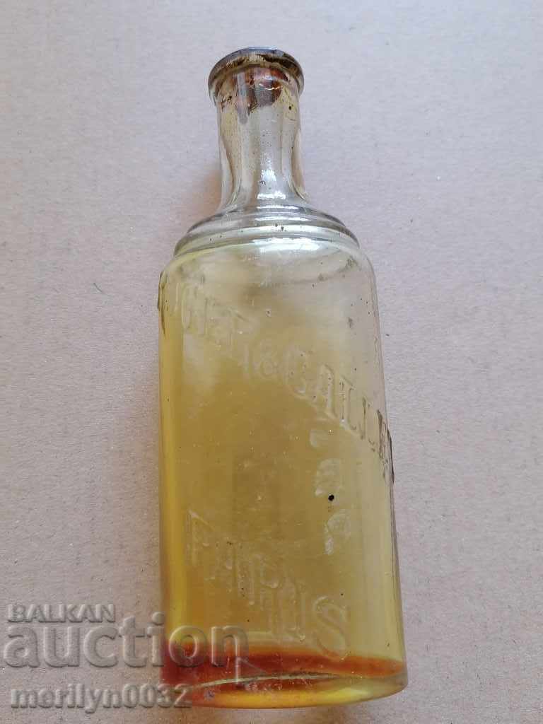 Old oil bottle, PARIS brand bottle