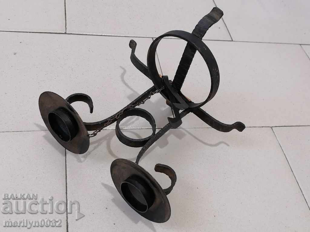 Delivery of Socialist wrought iron candlestick with dilaf