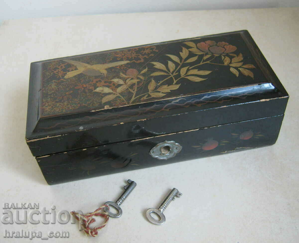 Old Japanese wooden box hand painted with a key