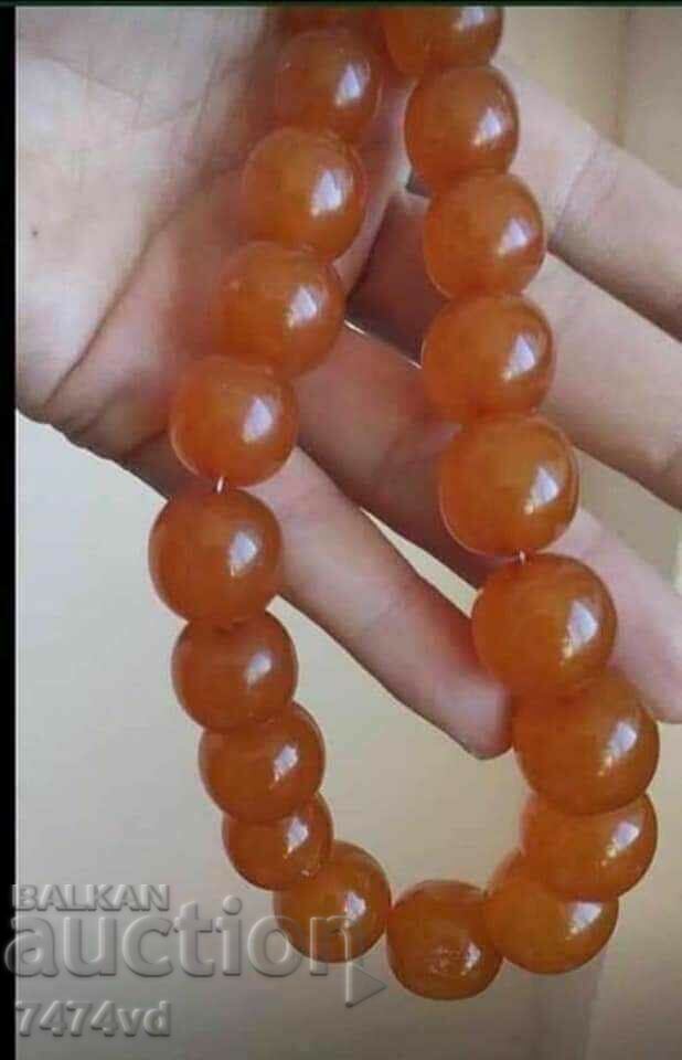 Auction  Old Russian amber necklace with round, thick grains, 44 grams