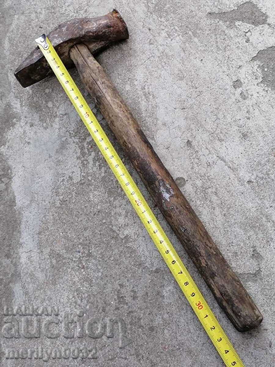Delivery of Very old hammer over 100 years, wrought iron tool Delivery of Very old hammer over 100 years, wrought iron tool
