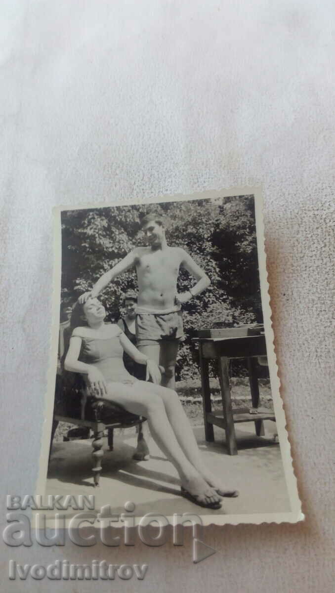 Photo Man and woman in swimsuit