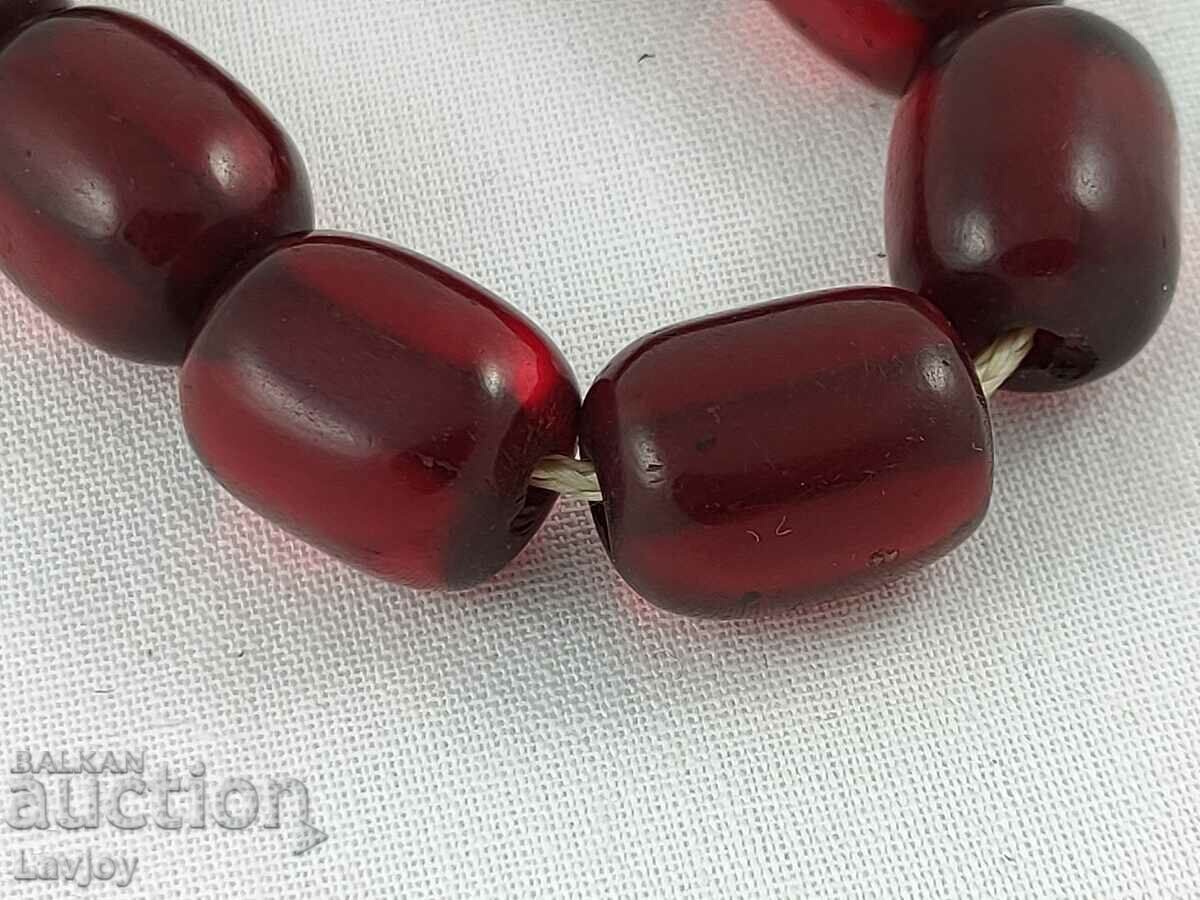 Delivery of Rosary cherry red transparent amber