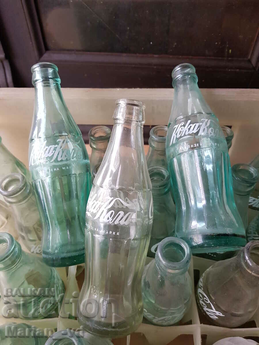 Auction Old Coca-Cola bottles with a cassette Auction Old Coca-Cola bottles with a cassette