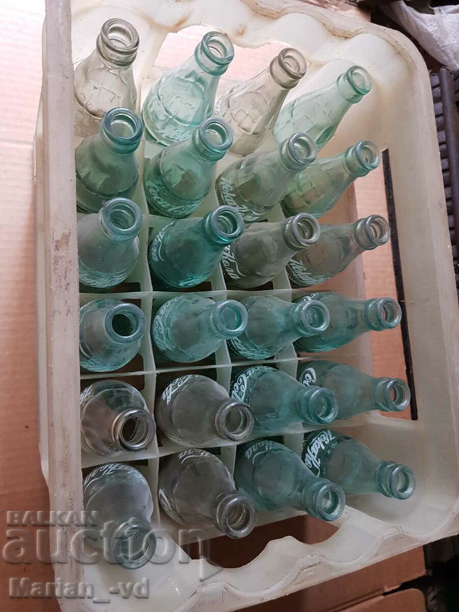 Delivery of Old Coca-Cola bottles with a cassette Delivery of Old Coca-Cola bottles with a cassette