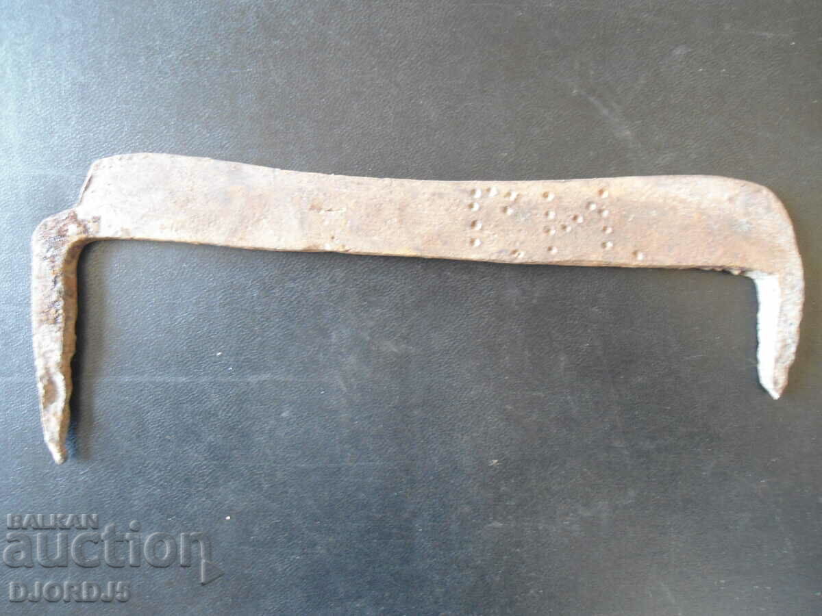 Old wrought scraper, signed