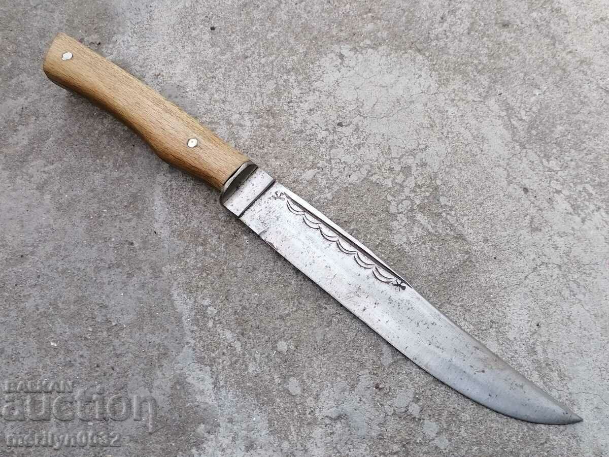 Old butcher knife with doodle engravings, knife blade