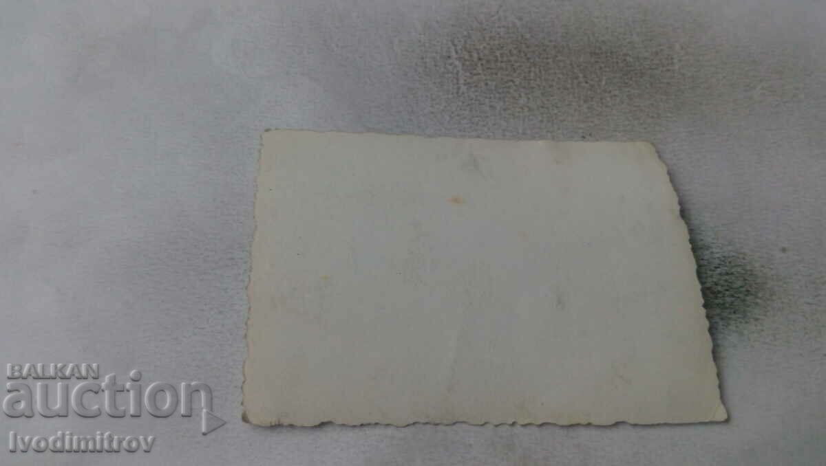 Photo Men and women on deck chairs on the beach with price 1.45 BGN | € 0.74 Photo Men and women on deck chairs on the beach with price 1.45 BGN | € 0.74