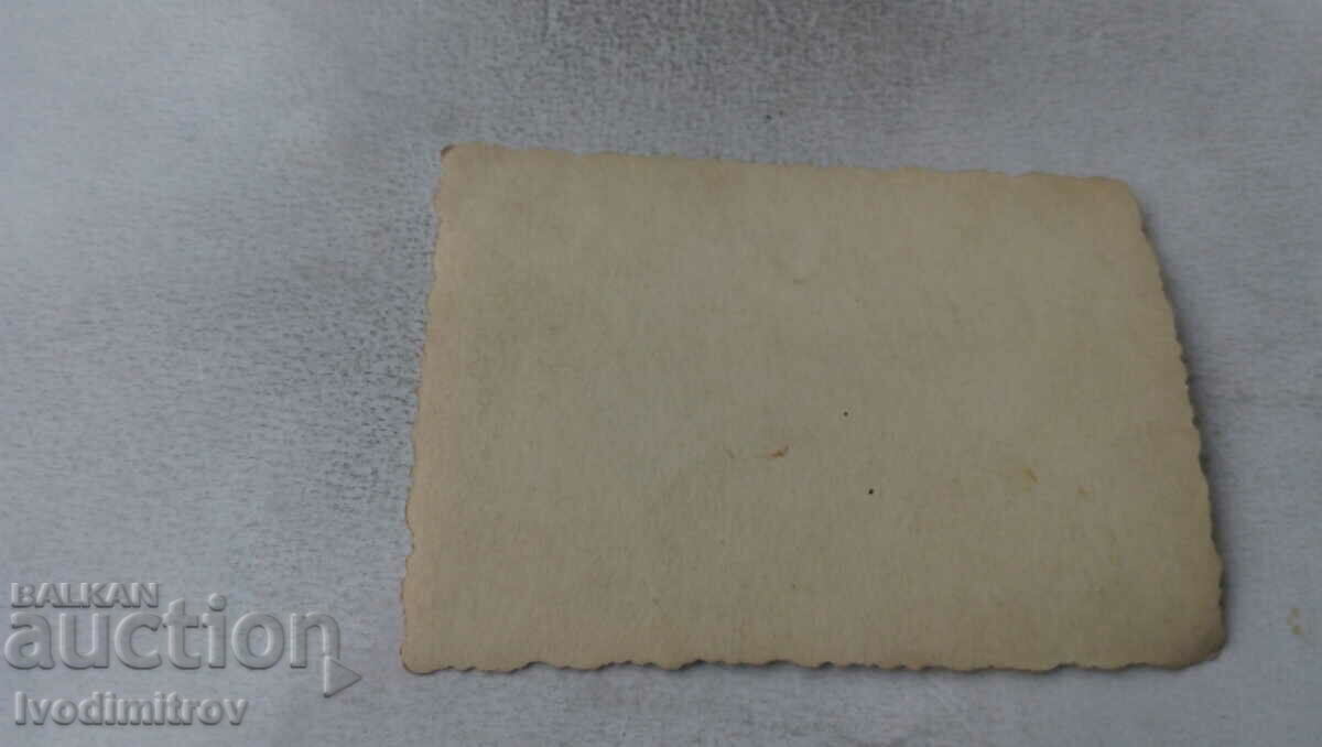 Photo Men and women on the street with price 0.85 BGN | € 0.43 Photo Men and women on the street with price 0.85 BGN | € 0.43