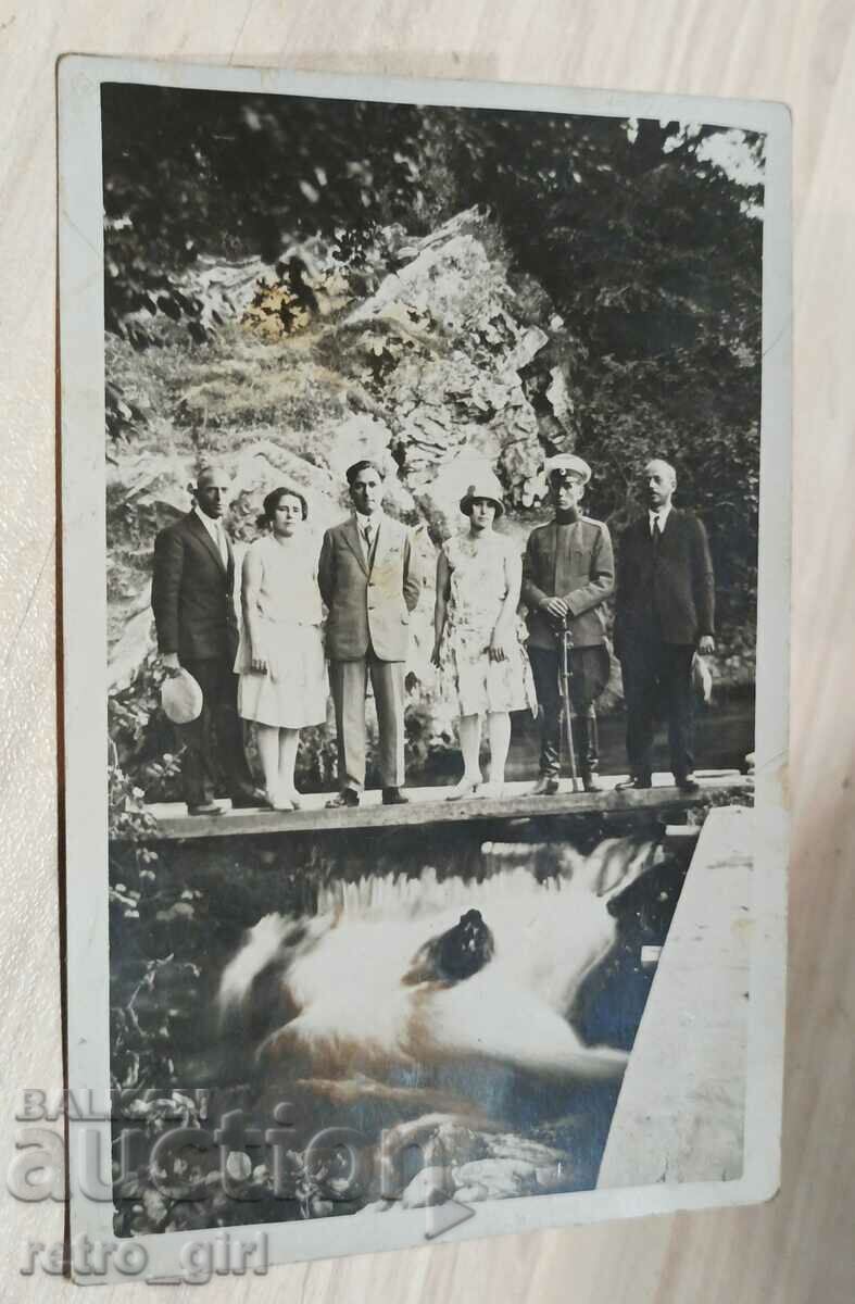 I am selling an old postcard, a photo.