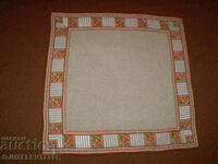 Old hand embroidered linen tablecloth