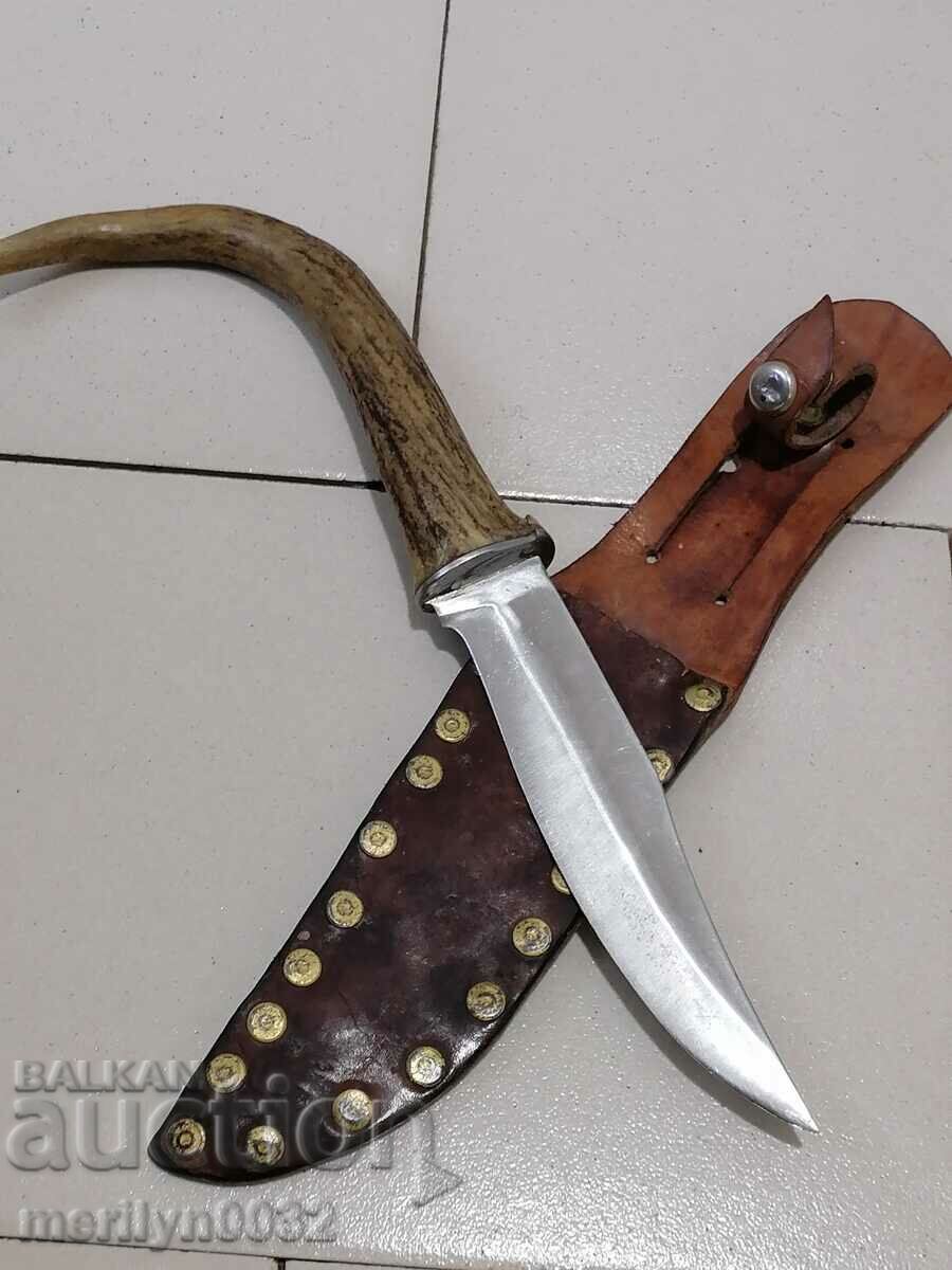 Hunting knife with a cane with a deer horn handle