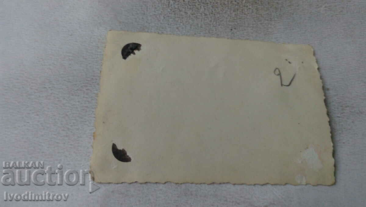 Photo Woman on the front fender of a retro car with price 3.65 BGN | € 1.87 Photo Woman on the front fender of a retro car with price 3.65 BGN | € 1.87