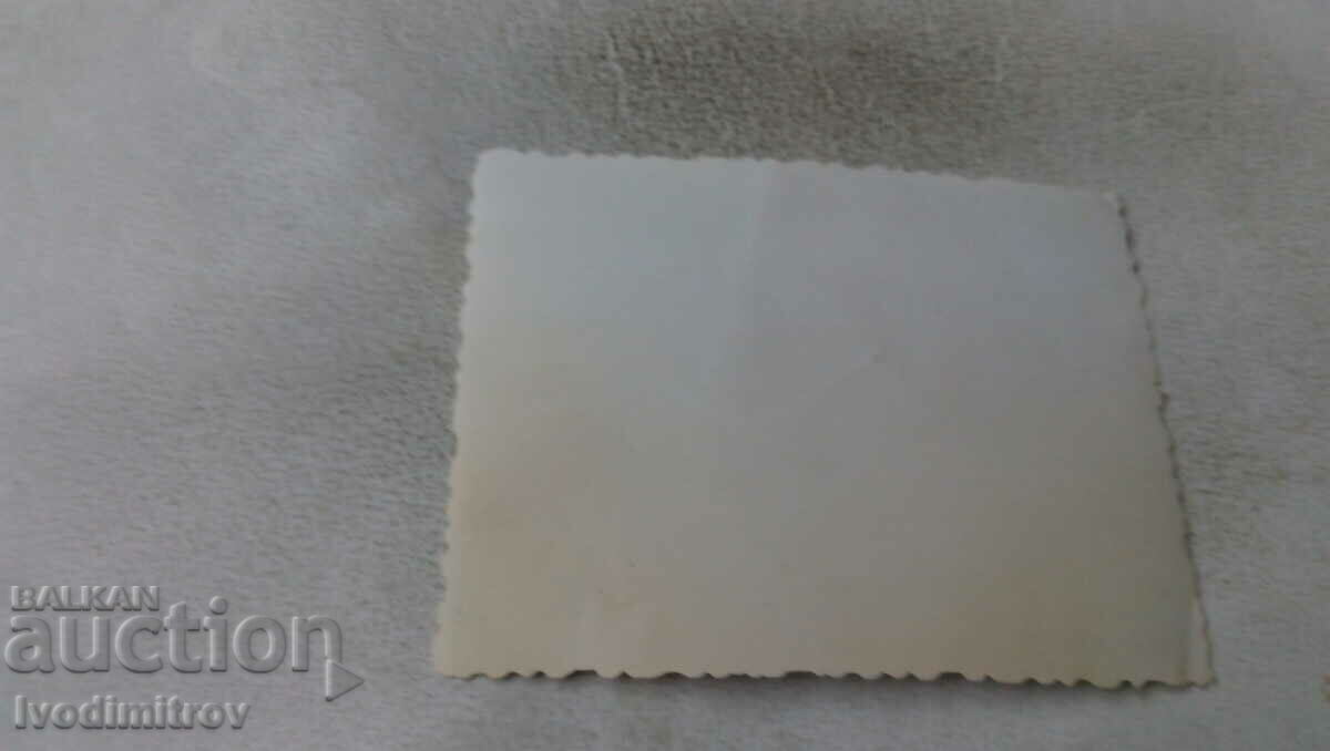 Photo Woman on the sidewalk with price 0.65 BGN | € 0.33 Photo Woman on the sidewalk with price 0.65 BGN | € 0.33