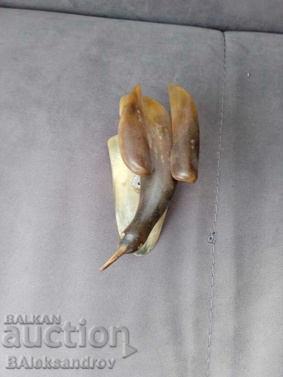Delivery of Old horn figurine, bird