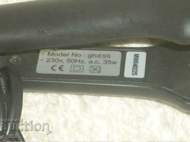 Auction curling iron Auction curling iron