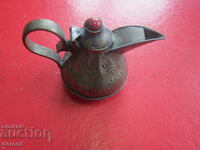 Ancient bronze jug minion jug