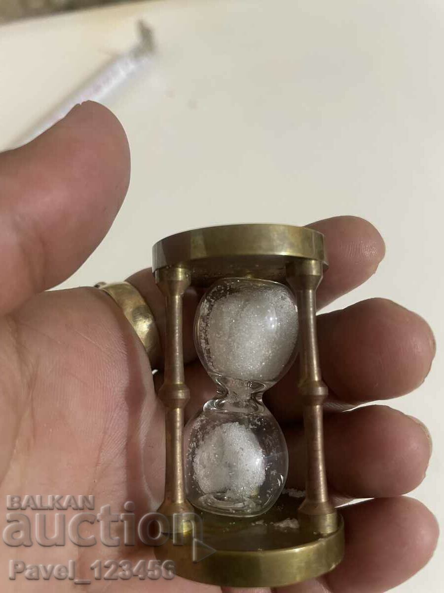 Auction miniature hourglass bronze / brass Auction miniature hourglass bronze / brass