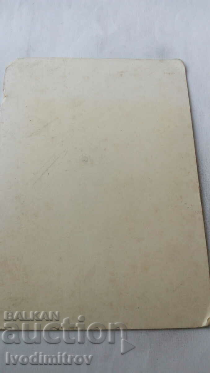 Photo A young woman reads a magazine in the yard Cardboard with price 8.65 BGN | € 4.42 Photo A young woman reads a magazine in the yard Cardboard with price 8.65 BGN | € 4.42