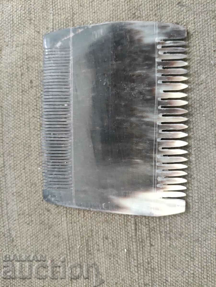 Auction  Bone comb