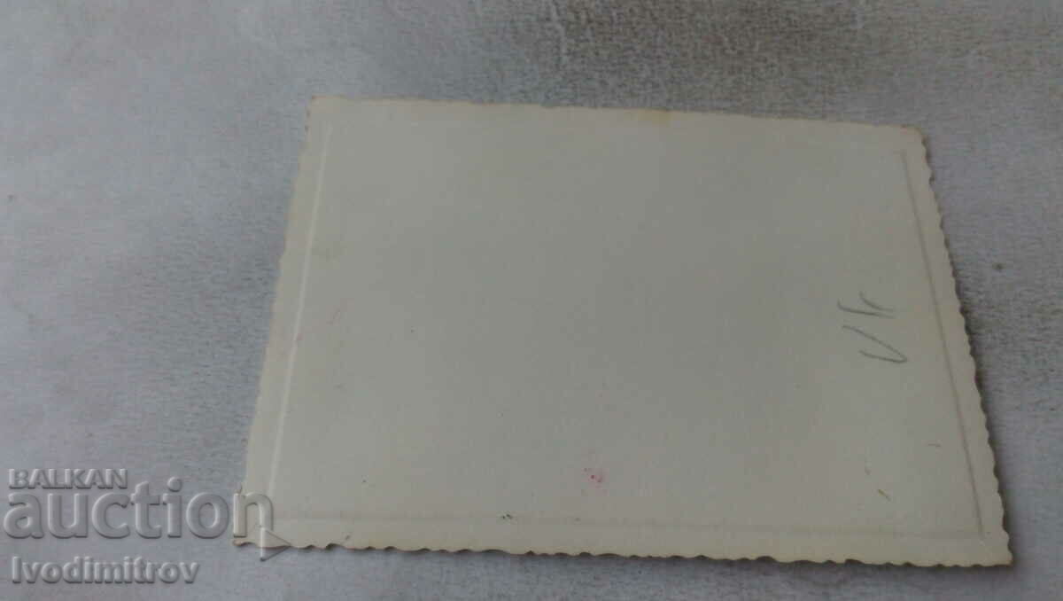 Photo of a man and two women on the sidewalk with price 1.65 BGN | € 0.84 Photo of a man and two women on the sidewalk with price 1.65 BGN | € 0.84