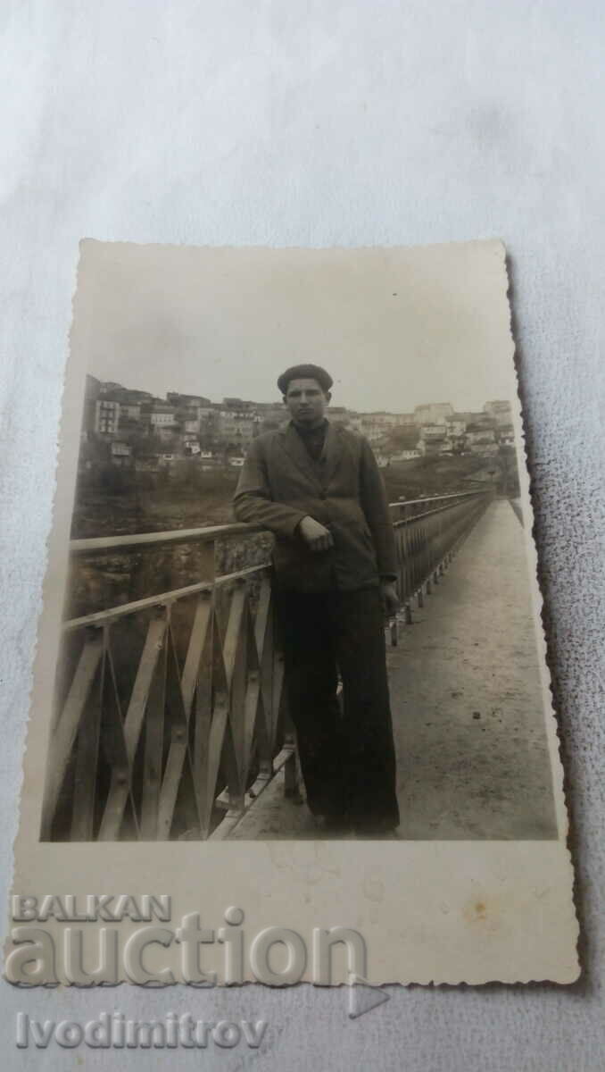 Photo Veliko Tarnovo Young man on the bridge