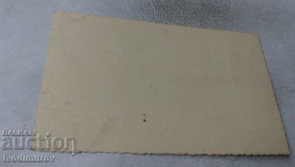 Photo Young woman in folk costume with price 2.35 BGN | € 1.20