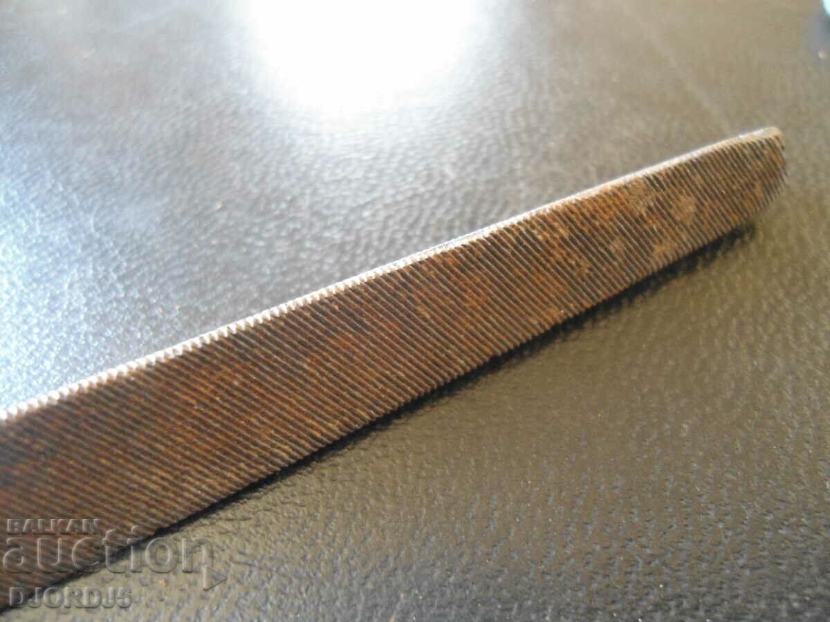 Old small triangular file with price 2.00 BGN | € 1.02 Old small triangular file with price 2.00 BGN | € 1.02