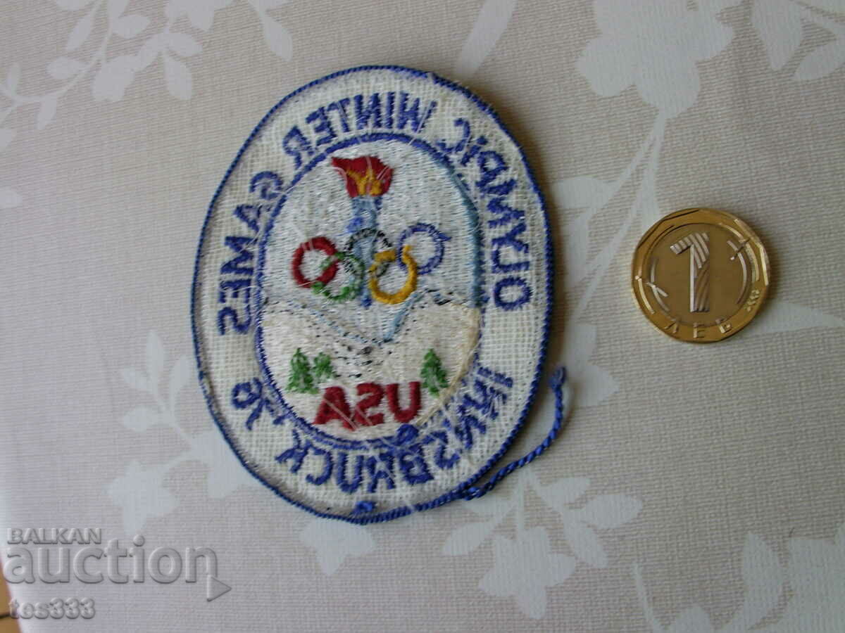 Livrarea Emblema Olimpică Innsbruck 76 SUA Jocurile Olimpice de iarnă