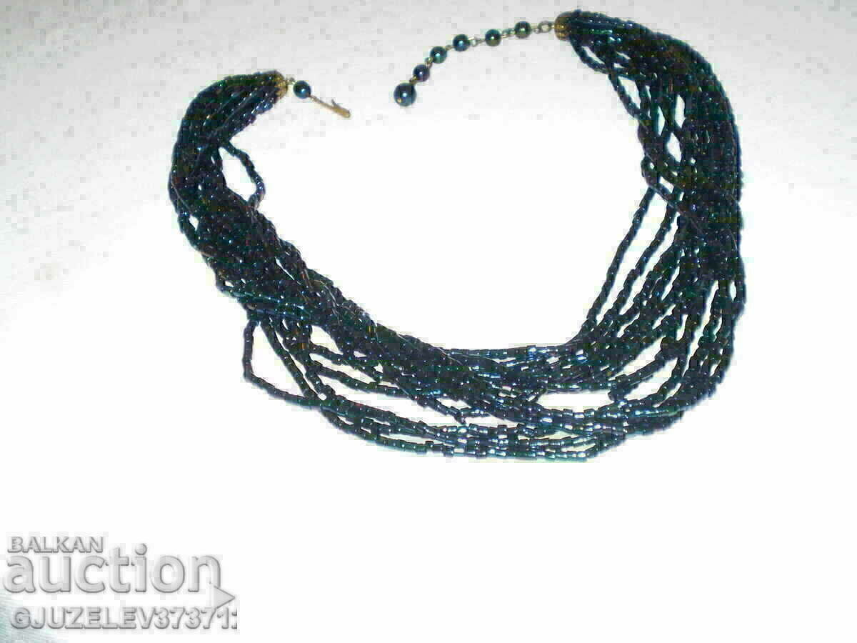 Delivery of Old lady's glass bead necklace Delivery of Old lady's glass bead necklace