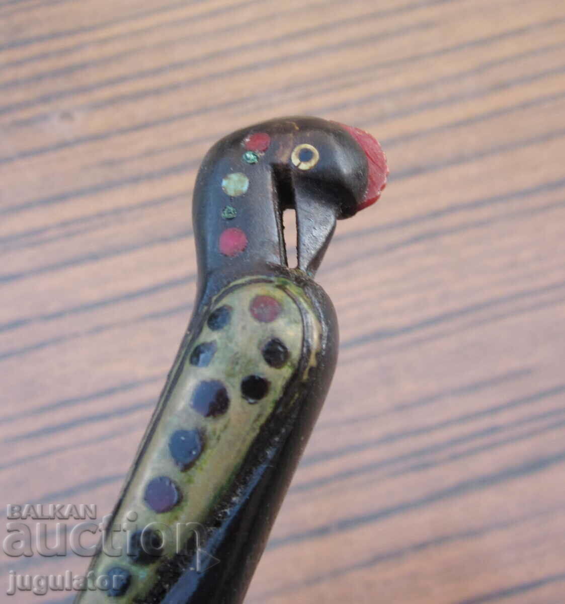 antique bronze bird opener with bone handle antique bronze bird opener with bone handle