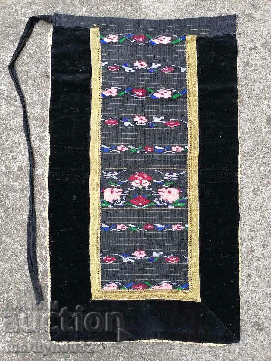 An old hand-woven apron with embroidery, costume