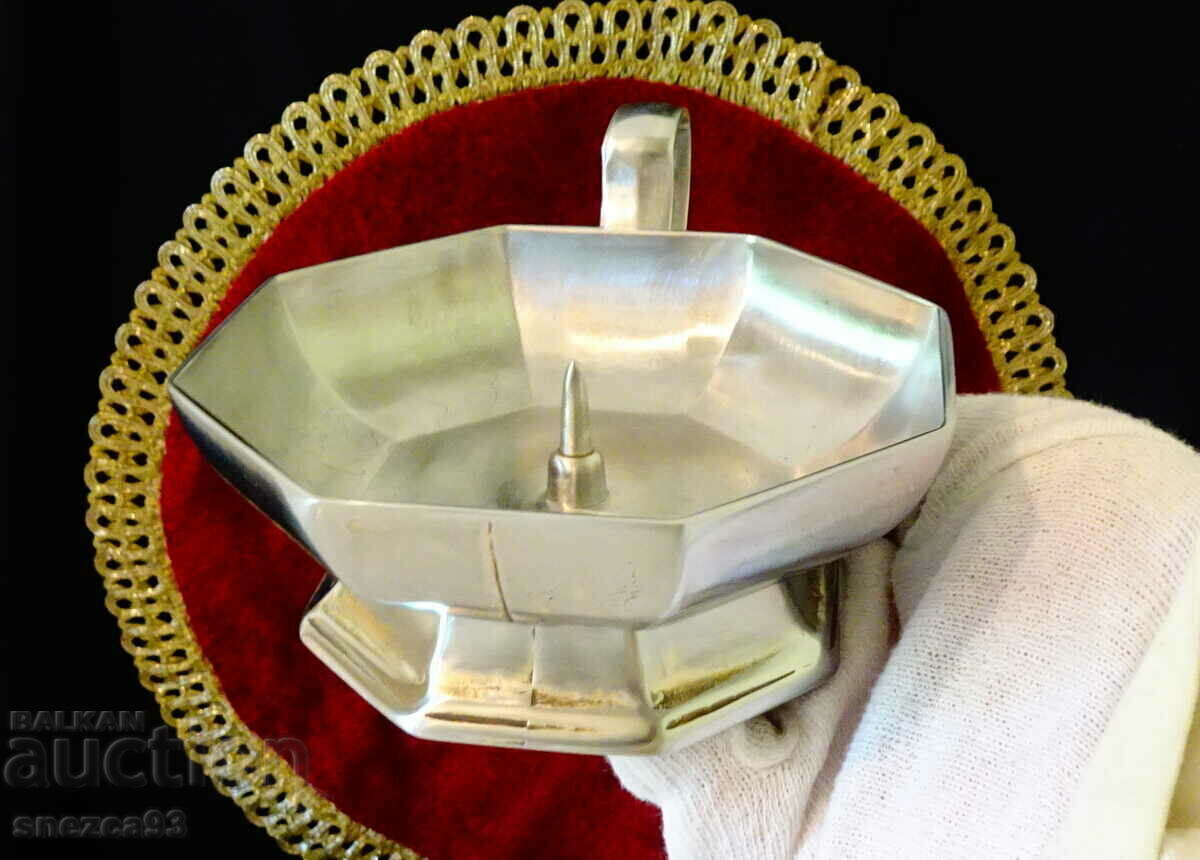 An octagonal tin candlestick. with price 19.00 BGN | € 9.71 An octagonal tin candlestick. with price 19.00 BGN | € 9.71