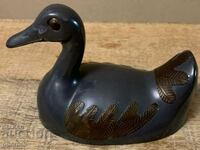 Antique metal massive duck figure