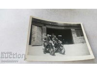 Photo Two soldiers with retro motorcycles