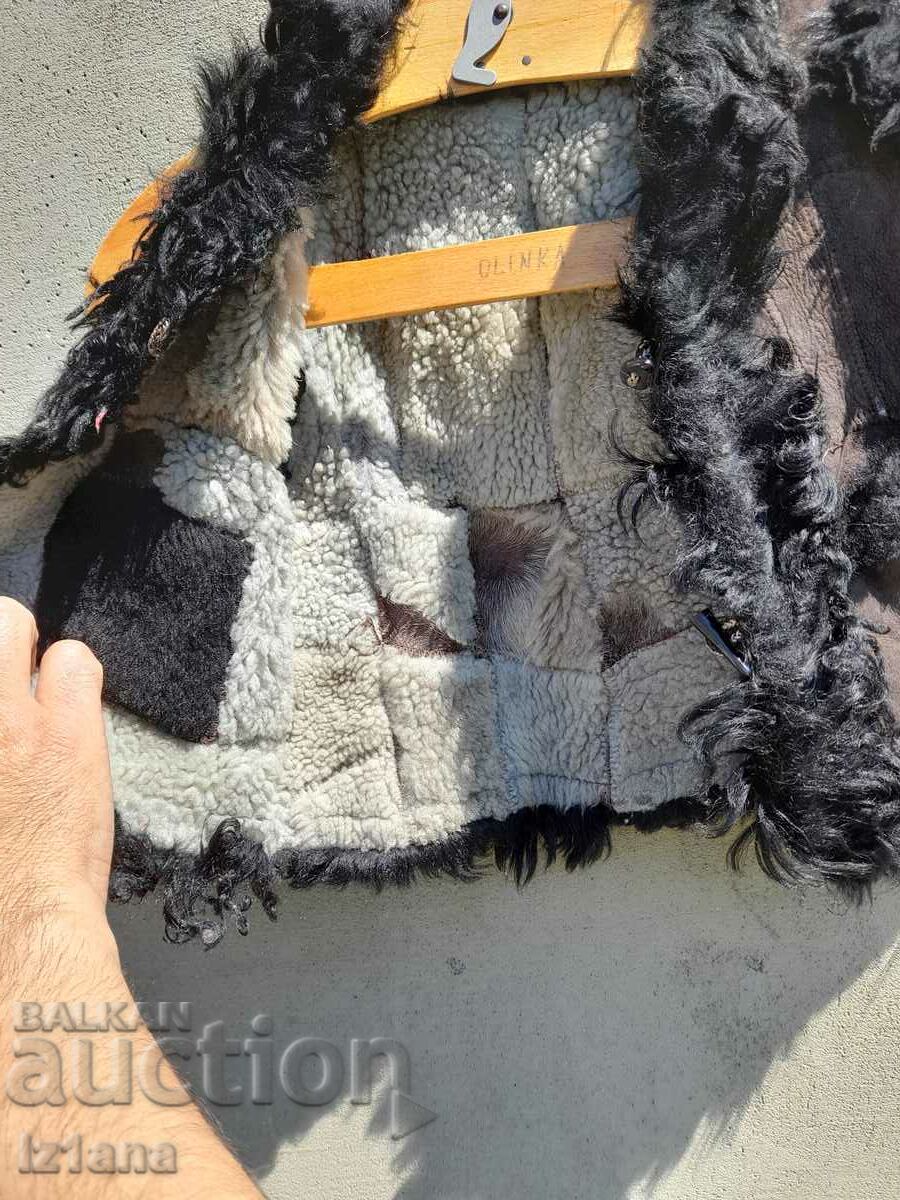 Auction  Old children's leather vest, vest