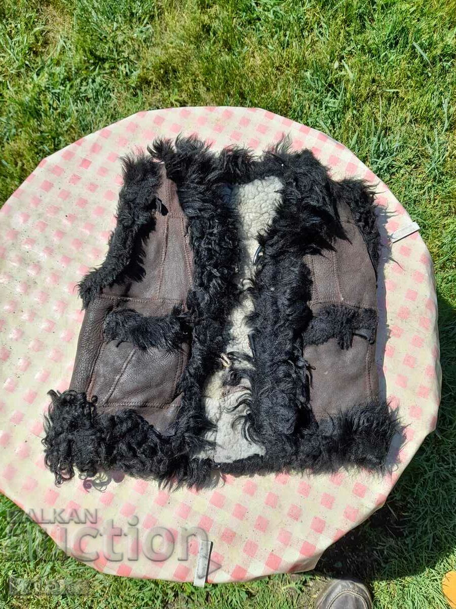 Delivery of Old children's leather vest, vest