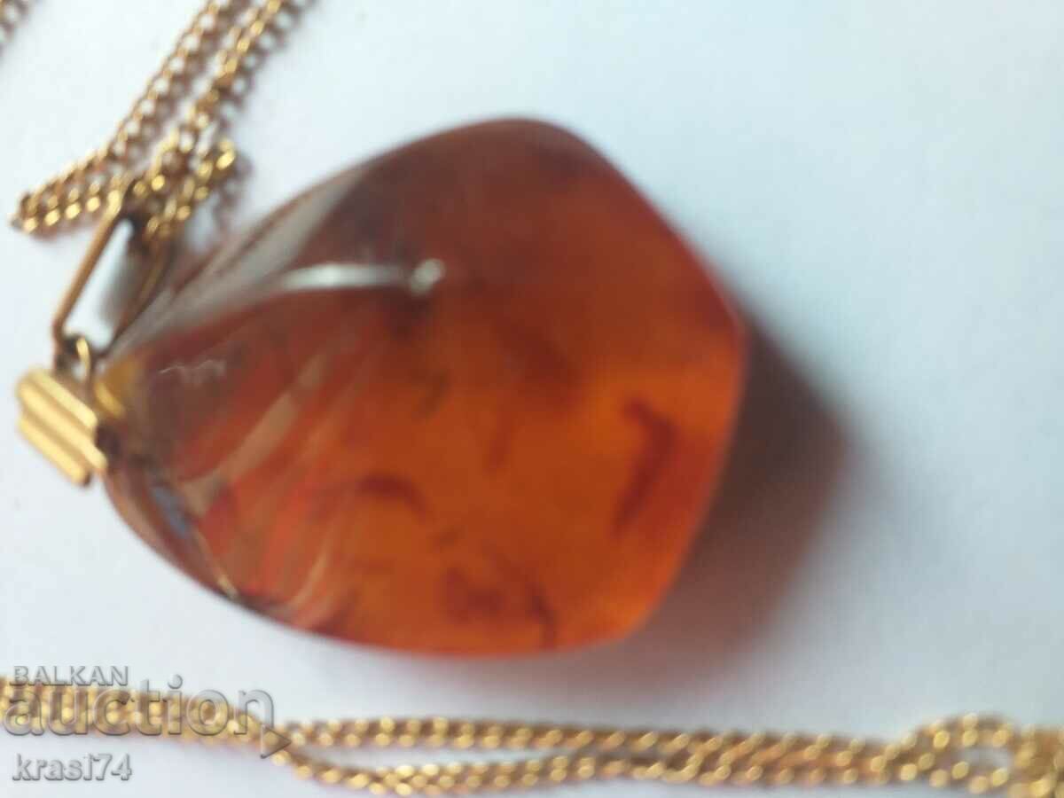 Gold-plated chain with amber pendant with price 40.00 BGN | € 20.45 Gold-plated chain with amber pendant with price 40.00 BGN | € 20.45