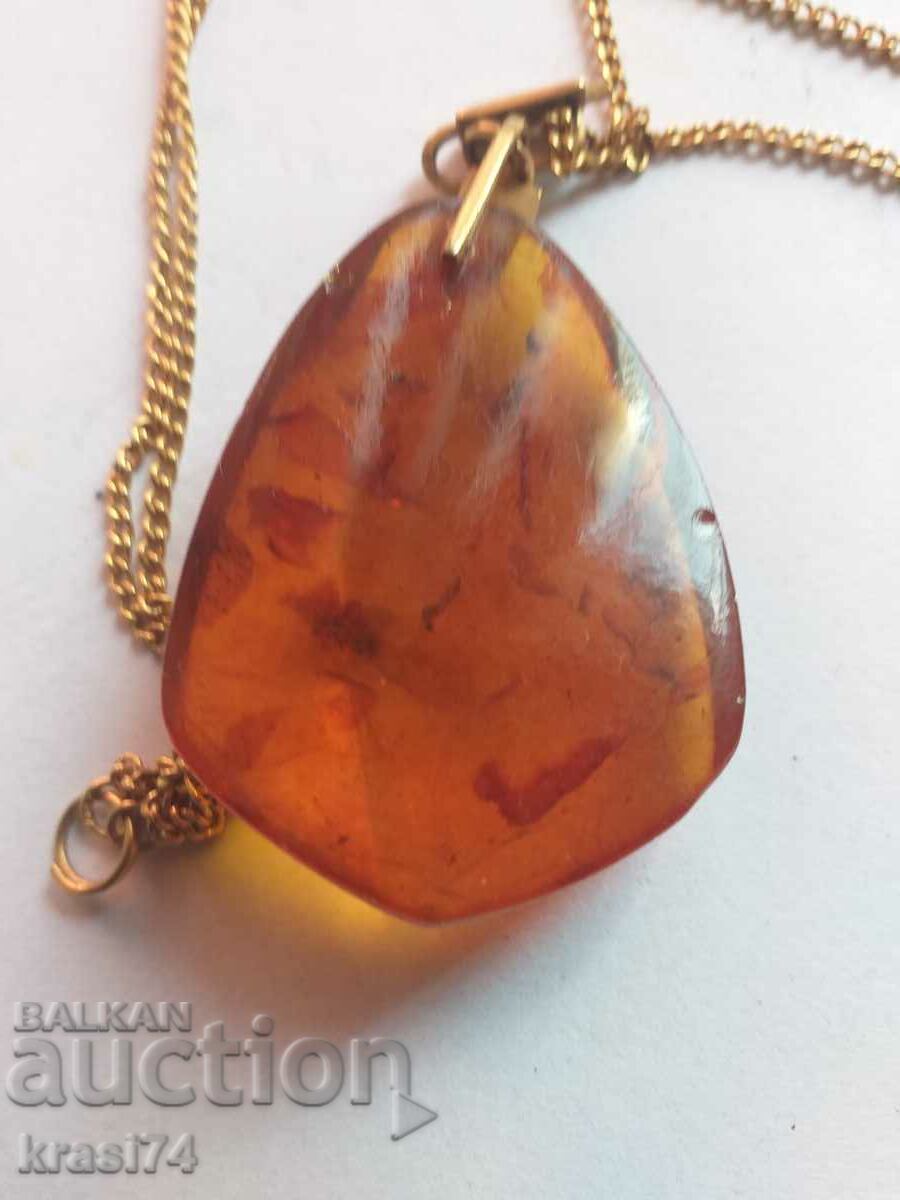 Auction Gold-plated chain with amber pendant Auction Gold-plated chain with amber pendant