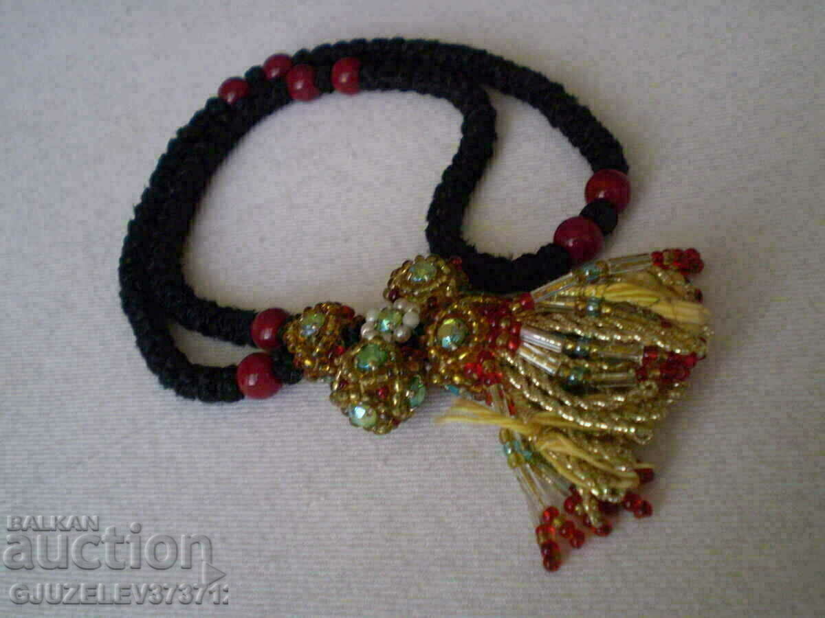 Auction  Christian ammolet with beads