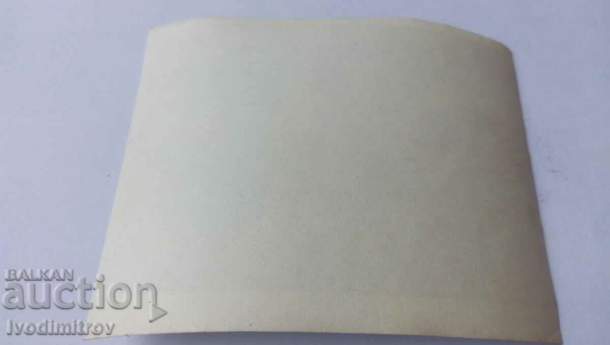 Photo Two men in shorts in front of retro trucks with price 2.65 BGN | € 1.35