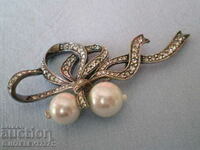 Designer silver brooch with pearls and zircons