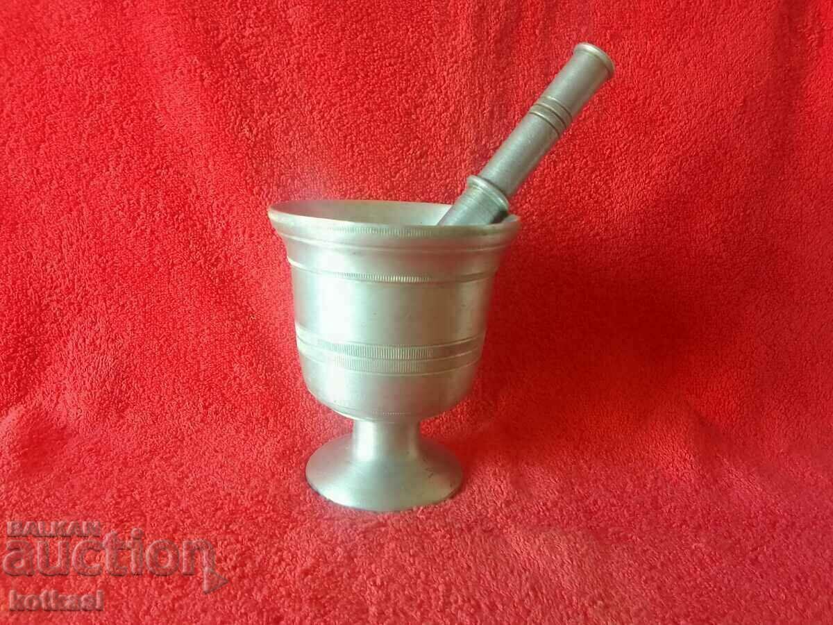 Old mortar made of white metal bronze aluminum mortar Old mortar made of white metal bronze aluminum mortar