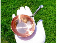 Hand-forged copper ladle.
