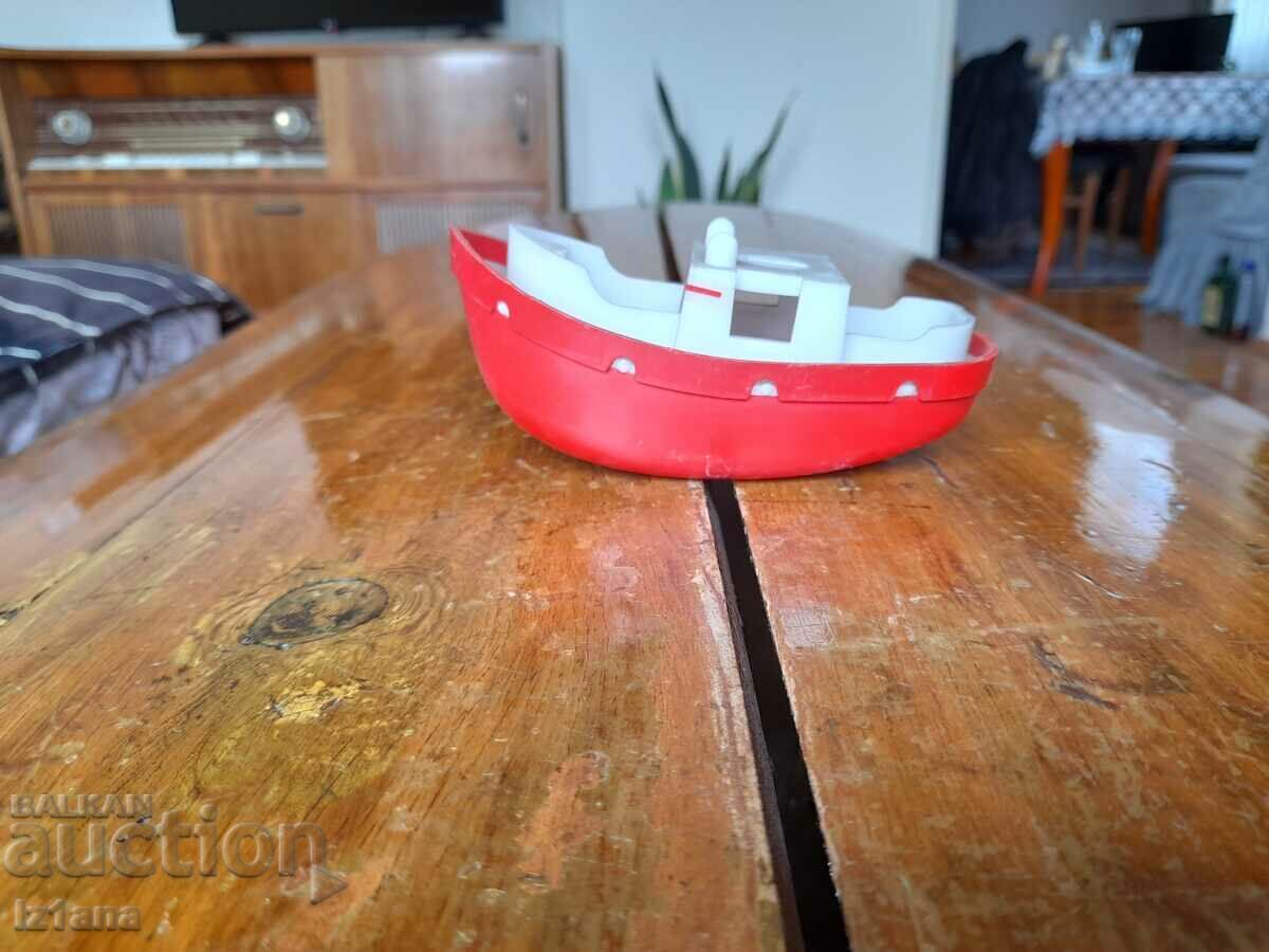 Old toy boat, speedboat Old toy boat, speedboat